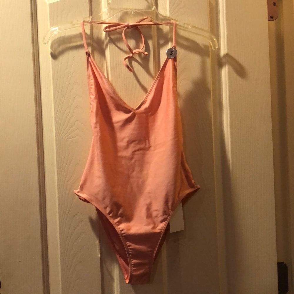 Pink open back one piece swimsuit